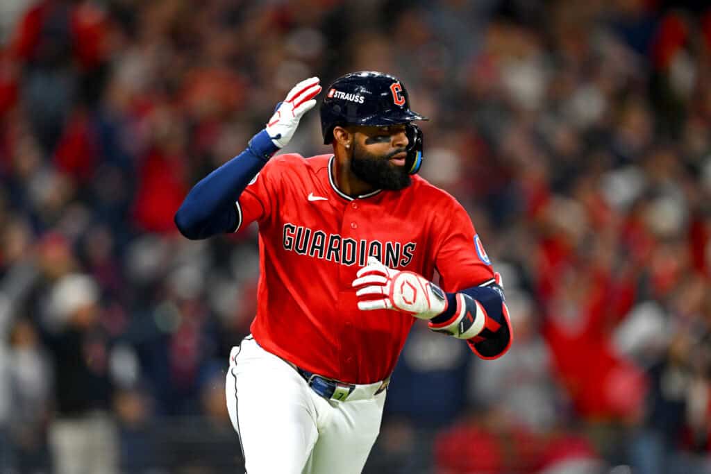 CLEVELAND, OHIO - OCTOBER 05: Jo Adell #7 of the Cleveland Guardians hits an RBI Triple during the eighth inning against the Chicago White Sox in game two of the American League Division Series at Progressive Field on October 05, 2026 in Cleveland, Ohio.