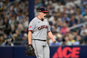 ST PETERSBURG, FLORIDA - OCTOBER 13: Parker Messick #77 of the Cleveland Guardians celebrates a double play against the Tampa Bay Rays during the third inning in game two of the American League Championship Series at Tropicana Field on October 13, 2026 in St Petersburg, Florida.