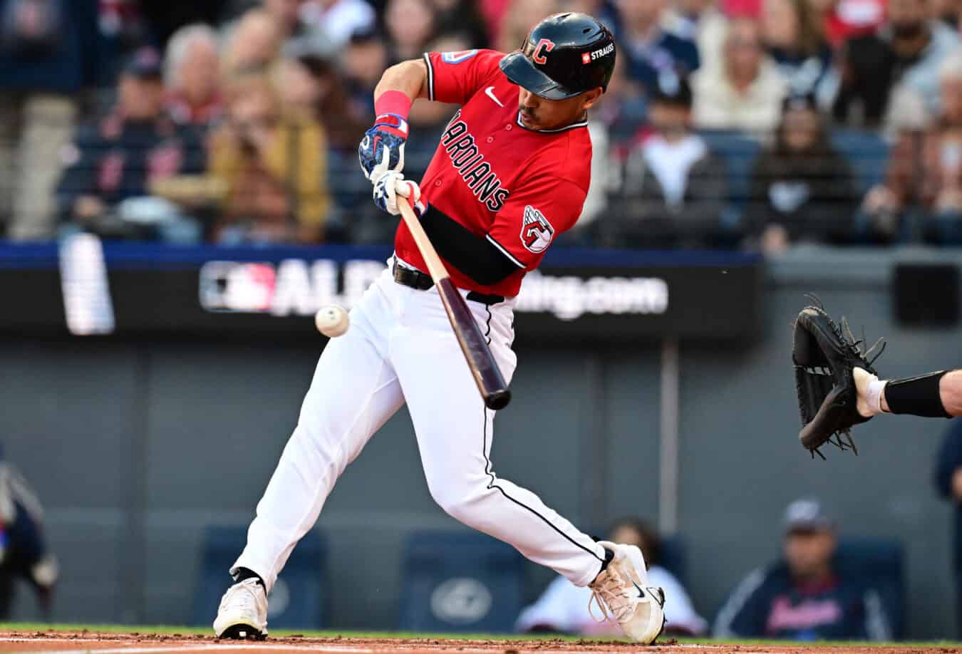 CLEVELAND, OHIO - OCTOBER 05: Steven Kwan #38 of the Cleveland Guardians hits a Single during the first inning against the Chicago White Sox in game two of the American League Division Series at Progressive Field on October 05, 2026 in Cleveland, Ohio.