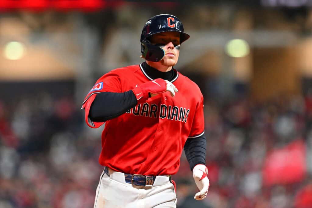 CLEVELAND, OHIO - OCTOBER 17: Travis Bazzana #37 of the Cleveland Guardians reacts after hitting a solo Home Run during the seventh inning against the Tampa Bay Rays in game four of the American League Championship Series at Progressive Field on October 17, 2026 in Cleveland, Ohio.