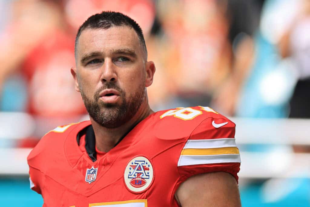 MIAMI GARDENS, FLORIDA - SEPTEMBER 27: Travis Kelce #87 of the Kansas City Chiefs looks on against the Miami Dolphins at Hard Rock Stadium on September 27, 2026 in Miami Gardens, Florida.